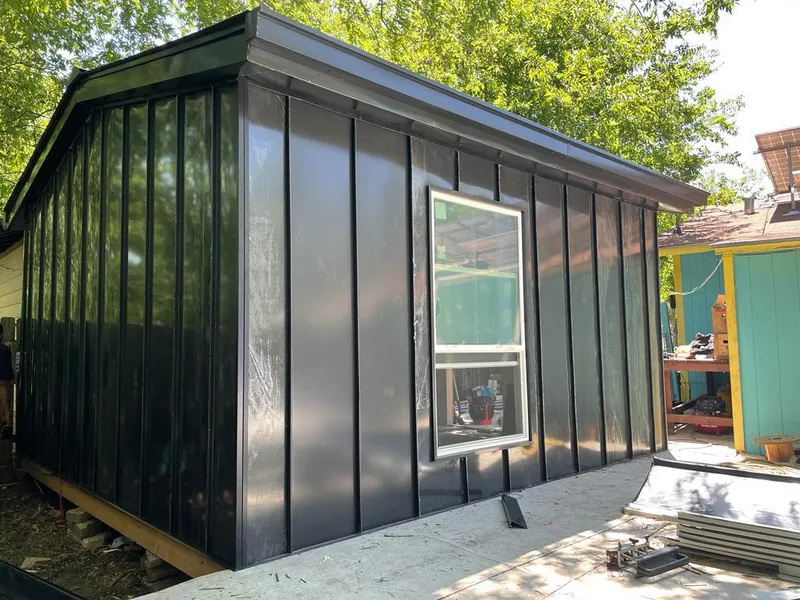 Black standing seam metal wall panels for Roof Inspection in South Fulton